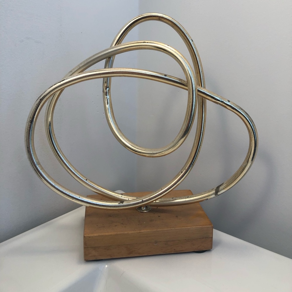 Elegant Gold Loop Sculpture